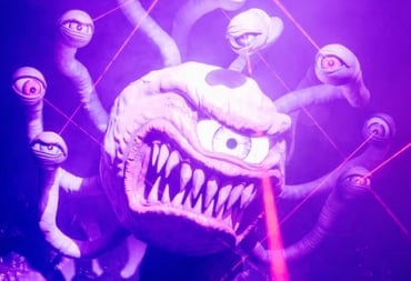 A photo of a ball-shaped one-eyed monster with multiple eye stalks.