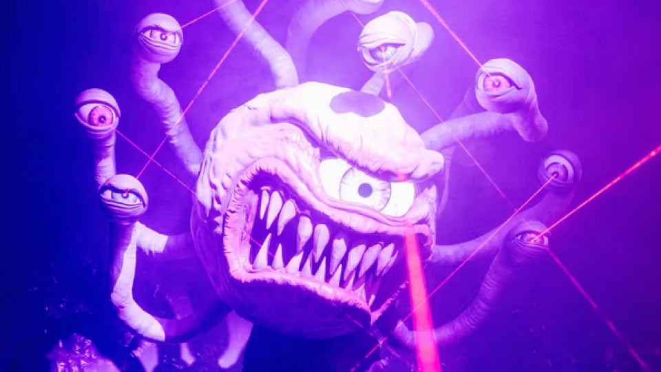 A photo of a ball-shaped one-eyed monster with multiple eye stalks.