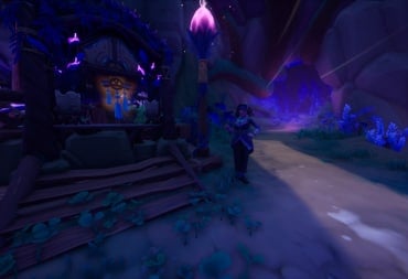 Elouisa standing in front of the Artifact Store in the Elderwood Central Stables in Palia.