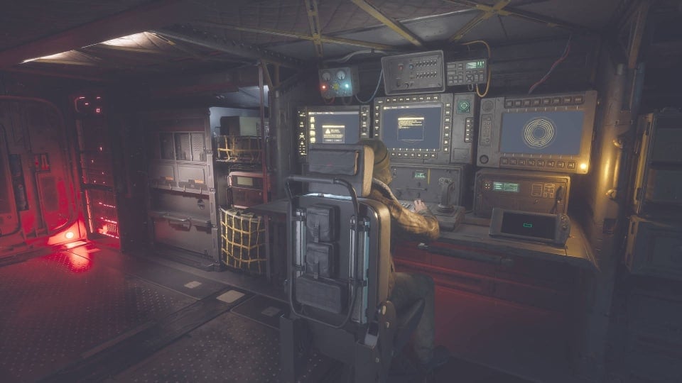 Tania Alver Sitting at the Computer in the APC in Hell is Us