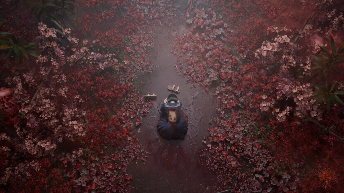 Hinako Shimizu kneeling in the mud in Silent Hill f