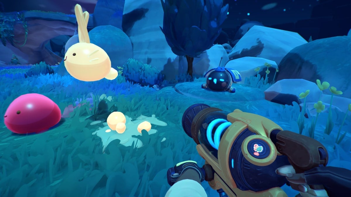 The Ranbow Fields at night with a Pink and Cotton Slime besides a Research Drone in Slime Rancher 2.