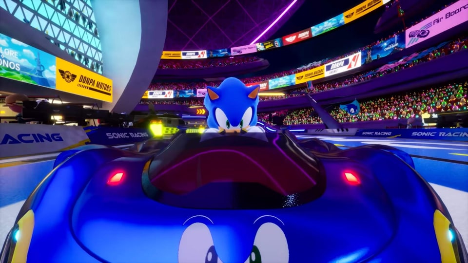 Sonic driving a car with his eyes on it as a motif in Sonic Racing: CrossWorlds