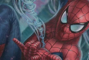 A close-up shot of Spider-Man facing the camera firing a strand of web.