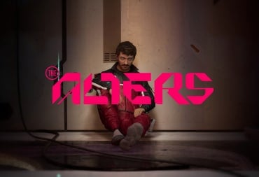 Jan Dolski sitting on the floor of the Womb with The Alters logo on top