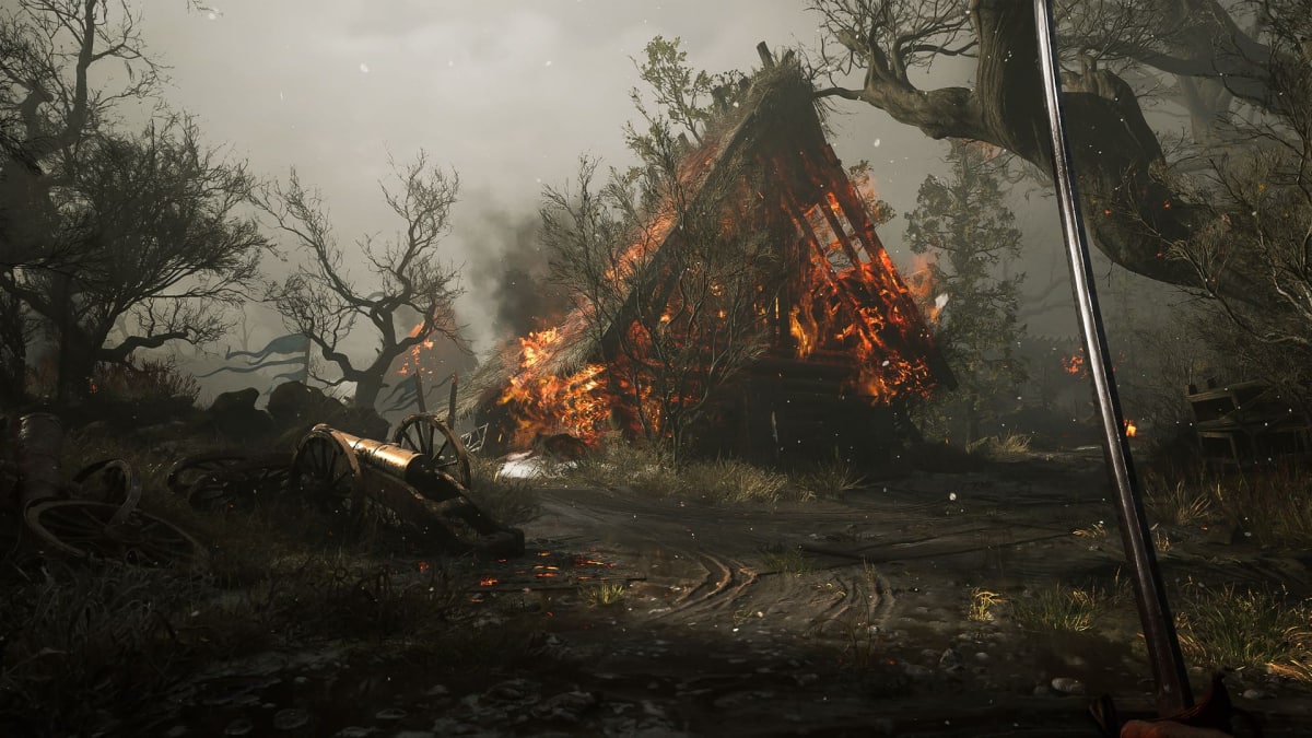 The player approaches a burning home in Valor Mortis