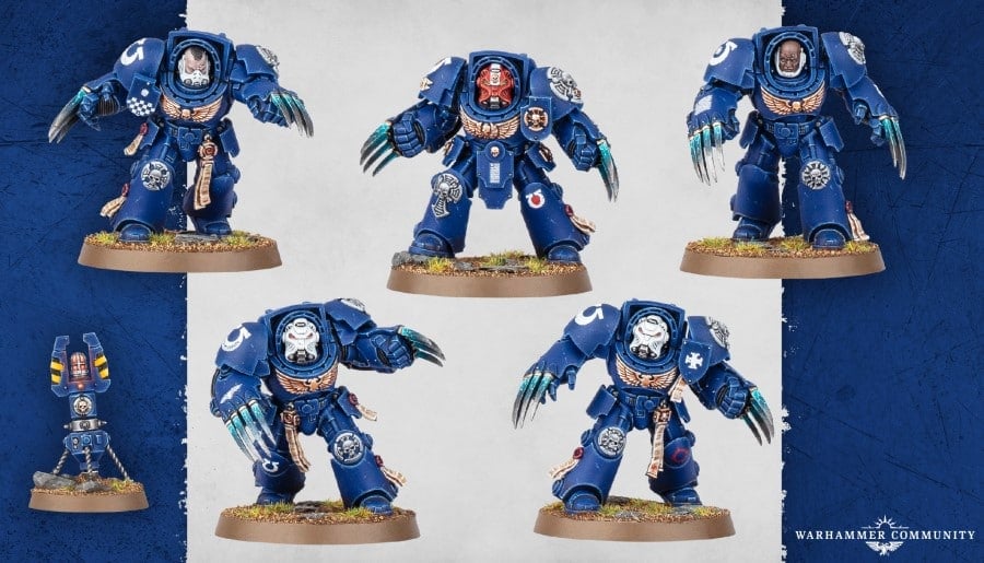 Five miniatures of Space Marines equipped with a pair of large battle claws.