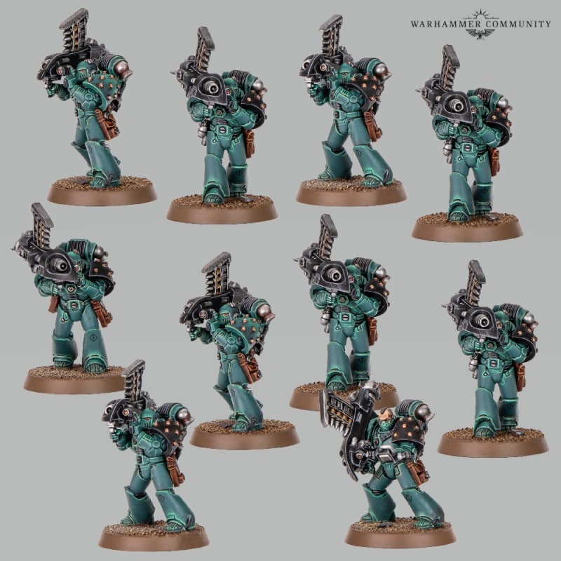 A display of ten space marine miniatures with heavy rocket launchers on a white background.
