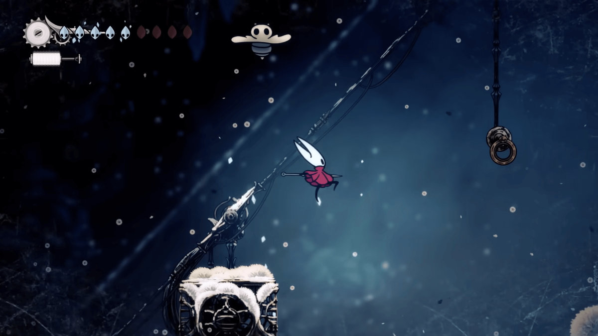 Hornet flying through the air, dandelions in he air like snow.